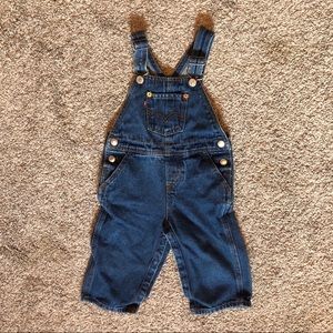 - Levi’s blue jean overalls 18M